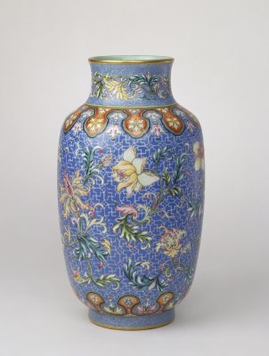 Pastel flowers in branch lines lantern bottle