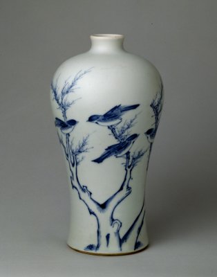 Blue tree bird figure becomes clear