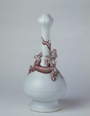 White plastic stick red dragon lines to garlic bottle